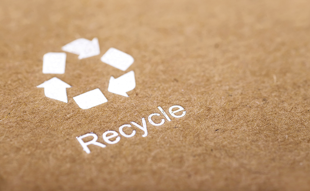 Recycle-symbool met de handtekening Recycle
